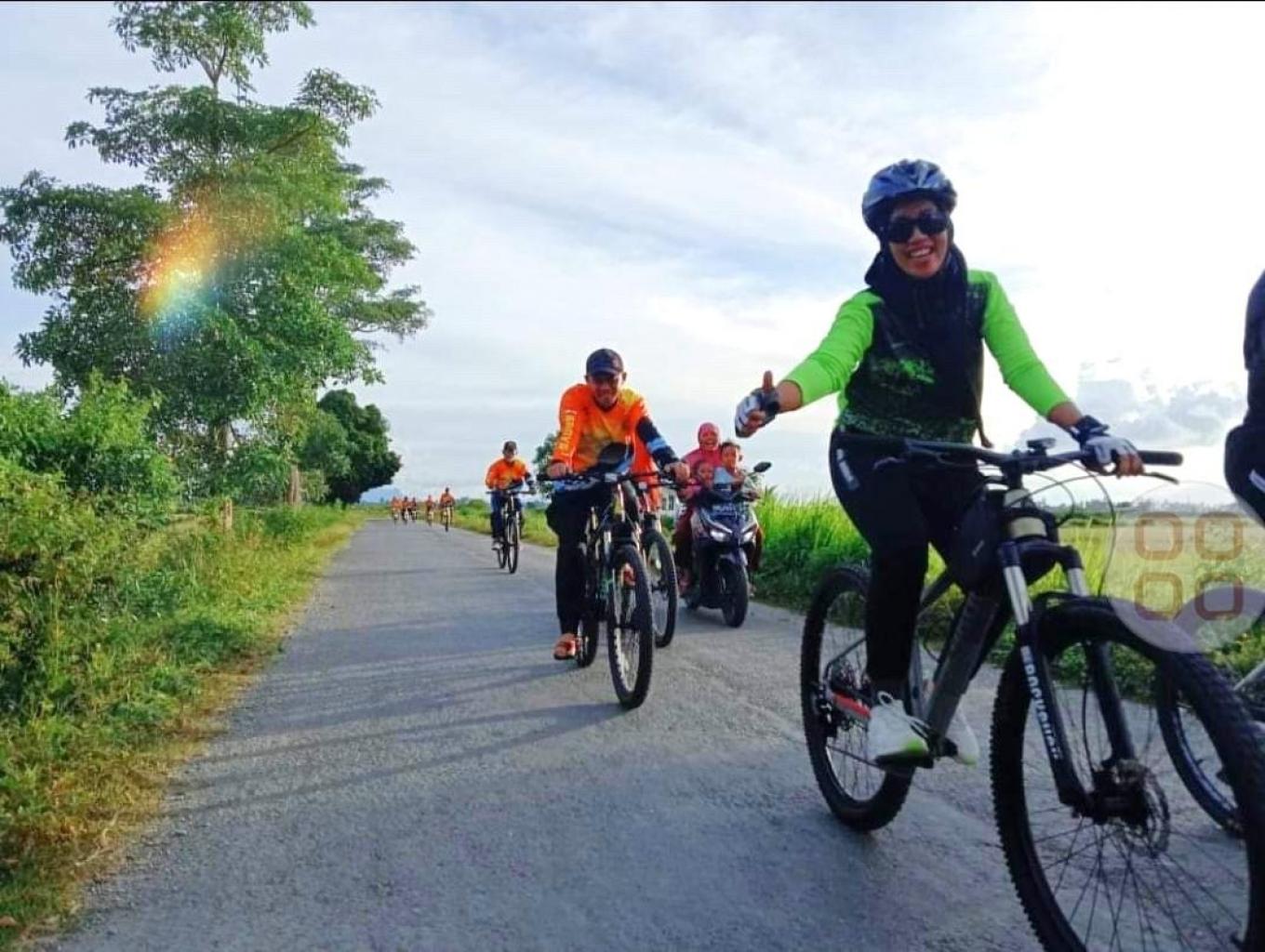 Wisata Bersepeda di Area Persawahan  Desa Waimital