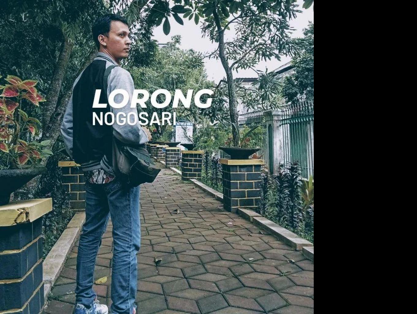 pedestrian dengan tanaman nagasari pada sisi jalan