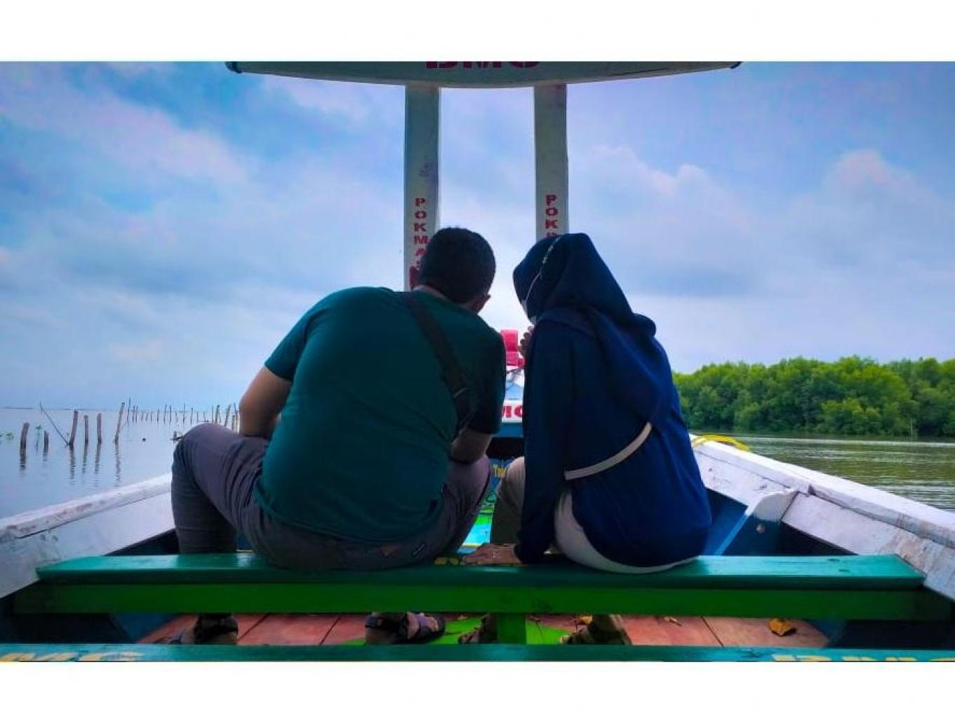 Numpak Prau (naik Perahu)