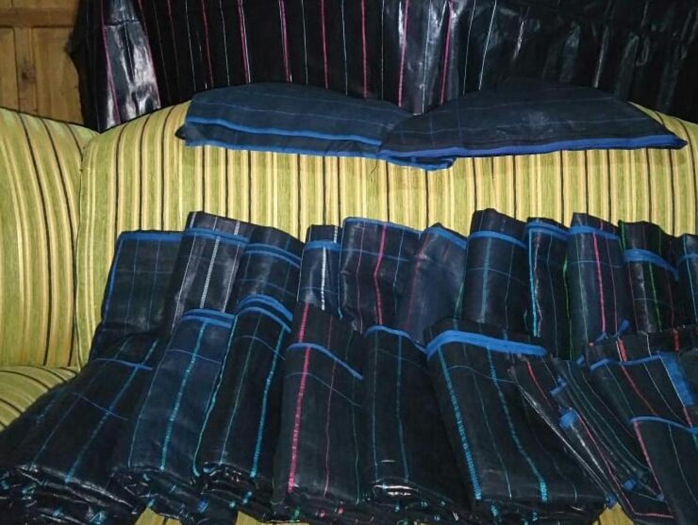Tope Le'leng (sarung Hitam)